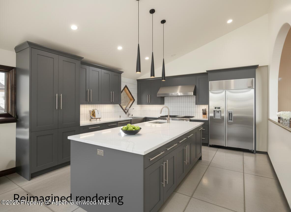 2345 Juniper Hill Road Aspen, CO 81611 - Photo 8 of 26 a kitchen with a sink a refrigerator and a stove top oven