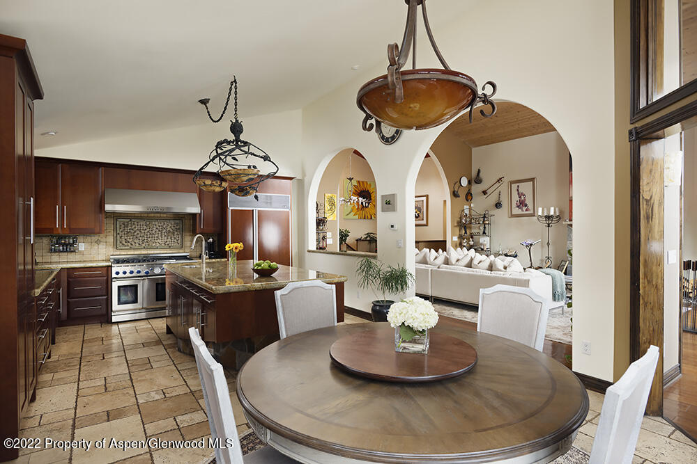 2345 Juniper Hill Road Aspen, CO 81611 - Photo 9 of 26 a living room with furniture and kitchen view
