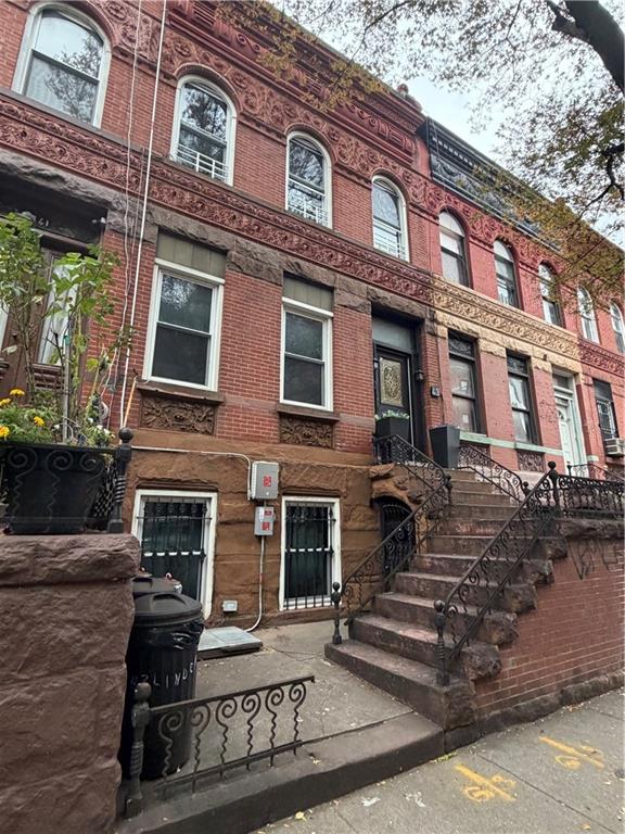 43 Linden Street Brooklyn, NY 11221 - Photo 2 of 9 a front view of a building with balcony