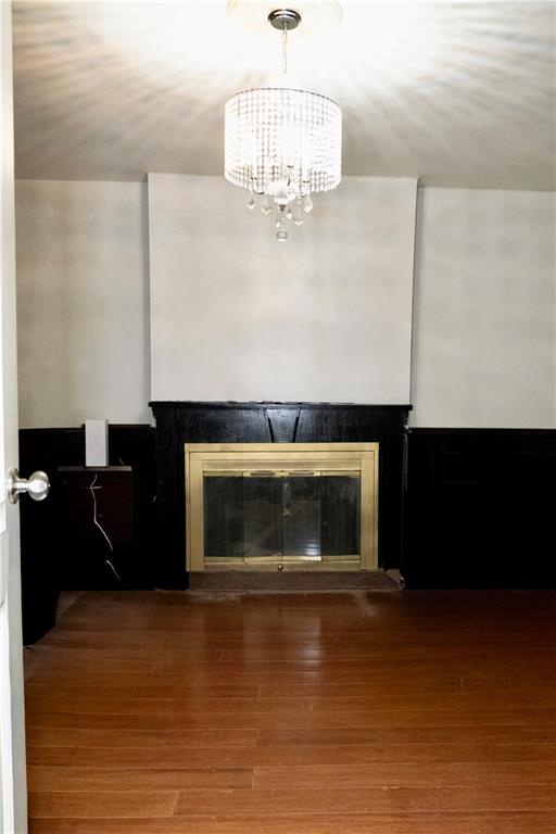 43 Linden Street Brooklyn, NY 11221 - Photo 9 of 9 a living room with a fireplace
