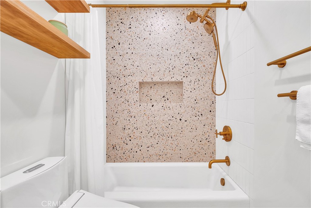 745 Main Street, Unit 107 El Segundo, CA 90245 - Photo 15 of 40 a bathroom with a bathtub and shower