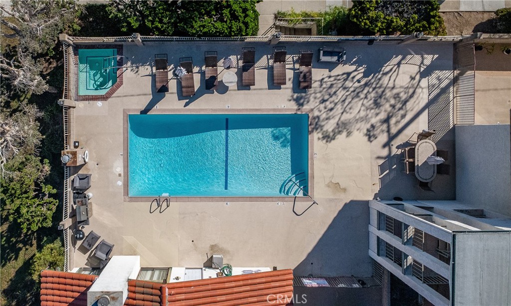 745 Main Street, Unit 107 El Segundo, CA 90245 - Photo 36 of 40 a view of roof deck with chairs and wooden fence