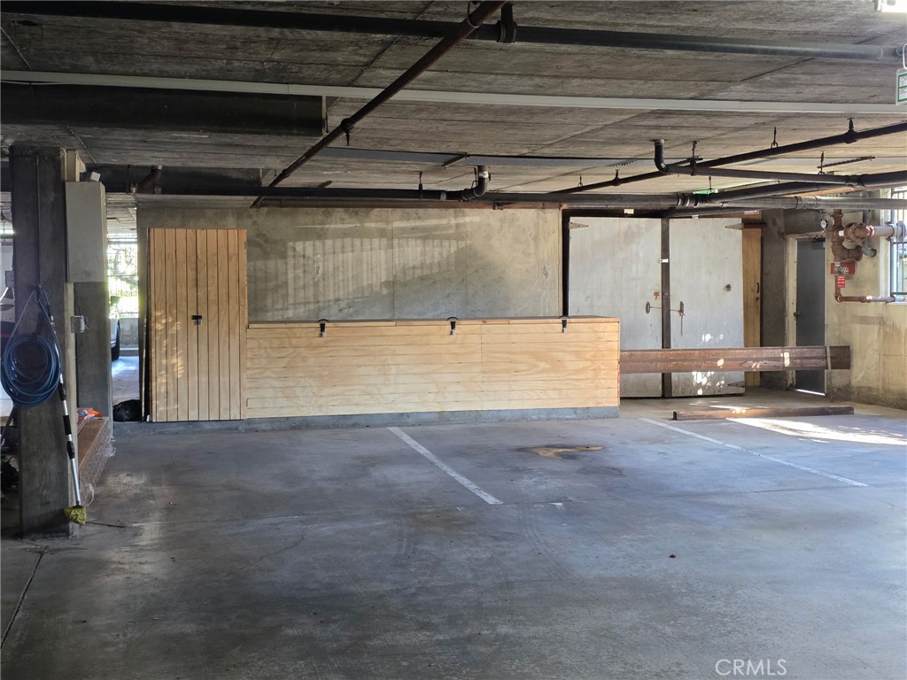 745 Main Street, Unit 107 El Segundo, CA 90245 - Photo 39 of 40 a view of a room with wooden floor