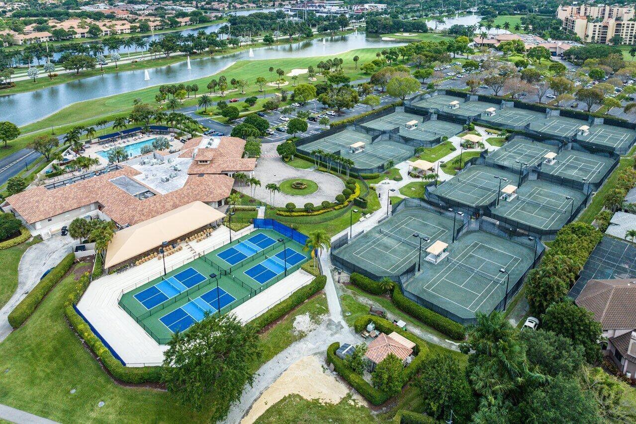 6840 Via Regina Boca Raton, FL 33433 - Photo 33 of 34 the plum boca pointe clubhouse an tennis