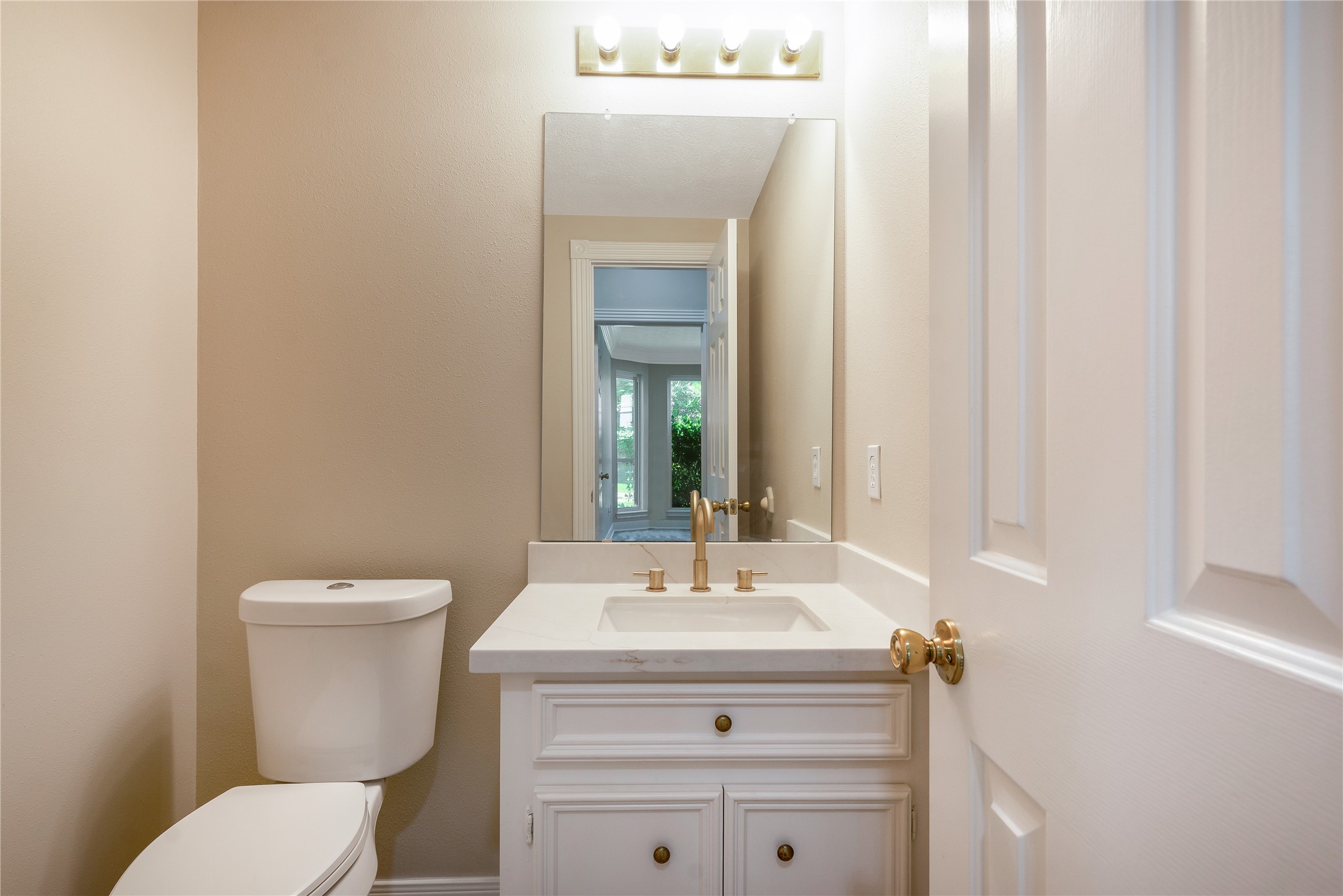8011 Null Court Spring, TX 77379 - Photo 20 of 41 Half bath located downstairs.