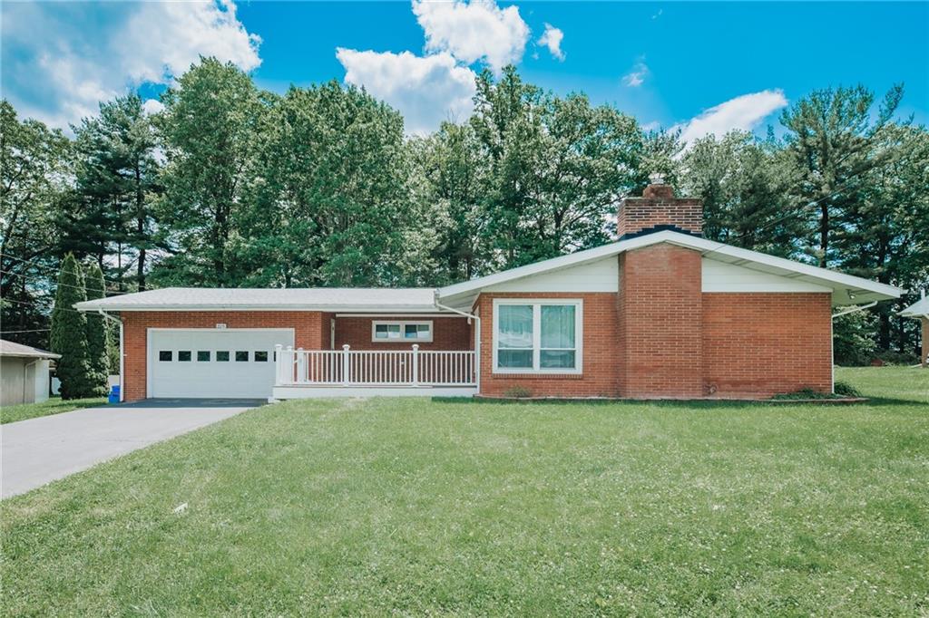 225 Courtland Road Indiana, PA 15701 - Photo 1 of 38 a house view with a garden space