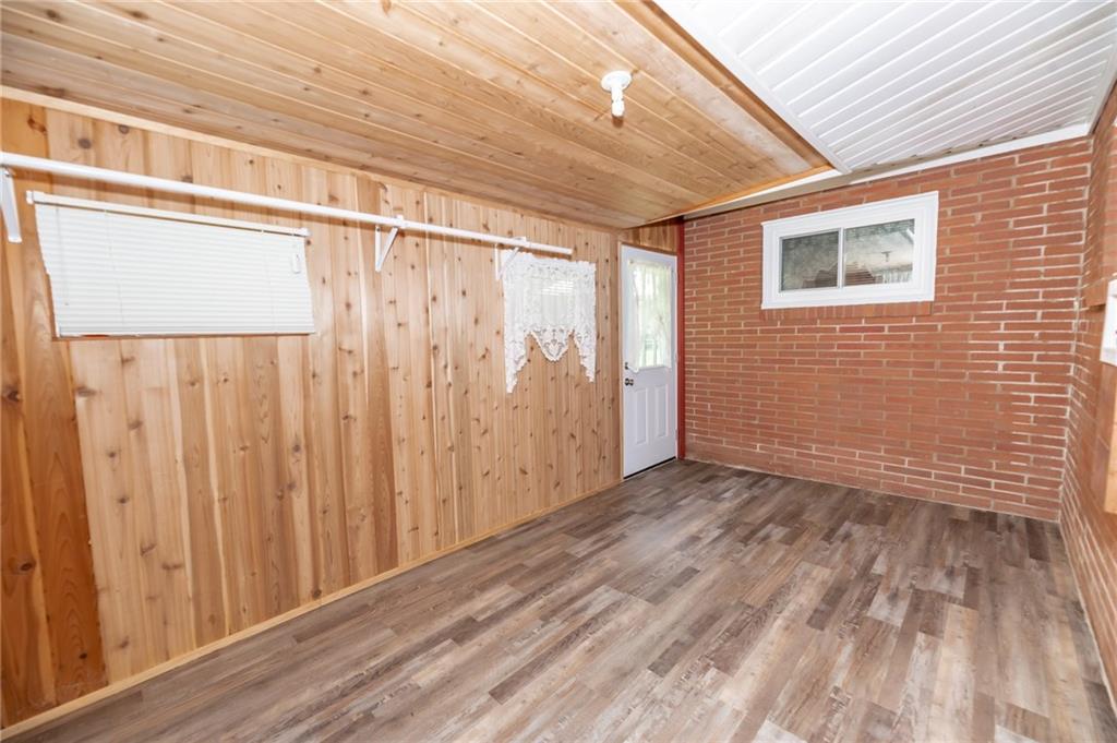 225 Courtland Road Indiana, PA 15701 - Photo 23 of 38 a view of a room with wooden floor and a window