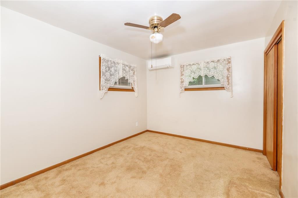 225 Courtland Road Indiana, PA 15701 - Photo 25 of 38 an empty room with a window and a ceiling fan