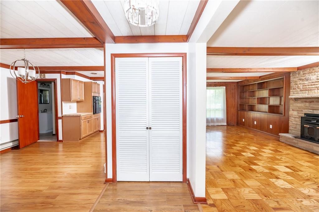 225 Courtland Road Indiana, PA 15701 - Photo 32 of 38 a view of a hallway with wooden walls and dining room