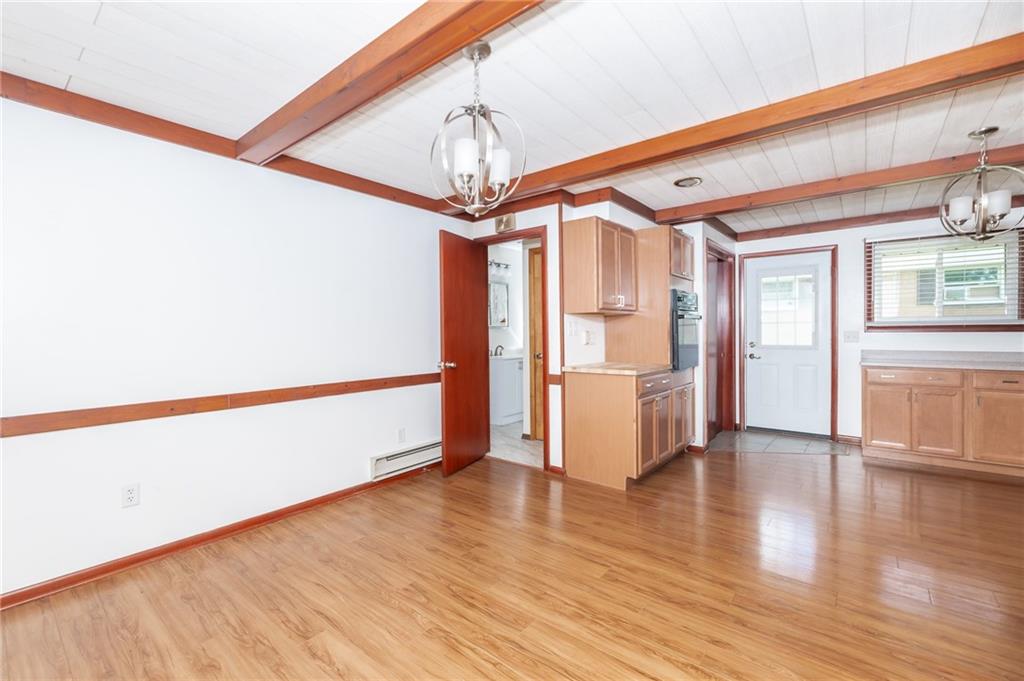 225 Courtland Road Indiana, PA 15701 - Photo 10 of 38 a view of an empty room with wooden floor and a window