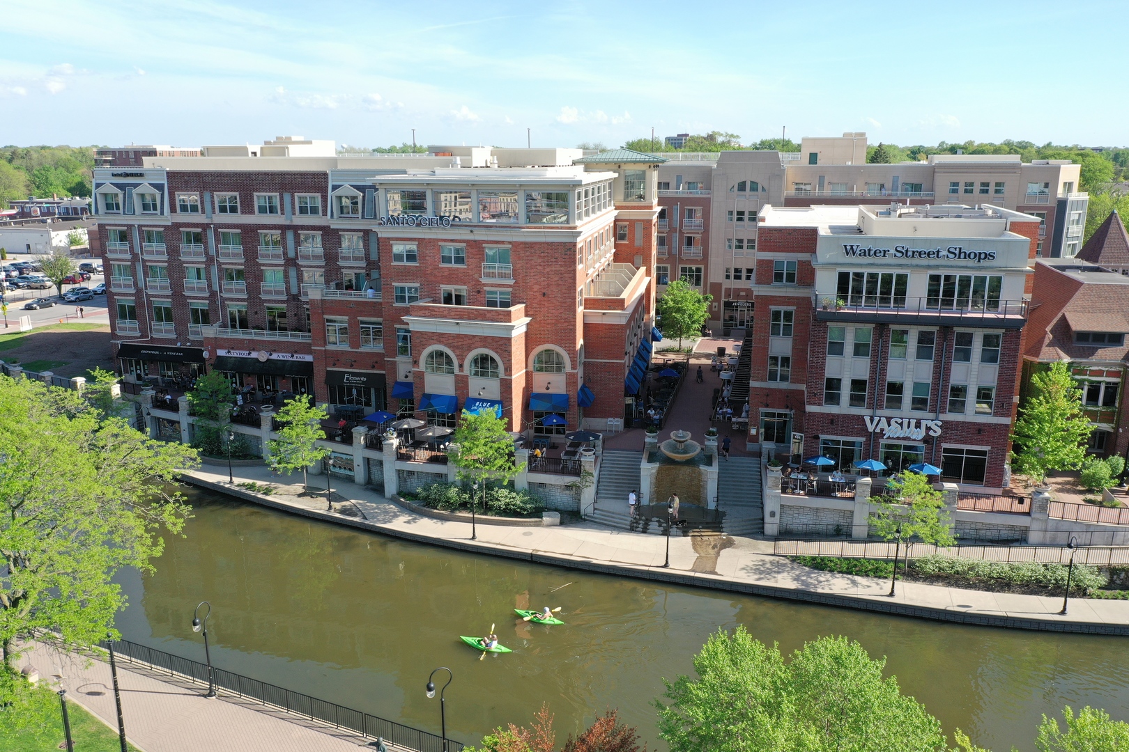 116 North Wright Street, Unit 5 Naperville, IL 60540 - Photo 25 of 62 a view of a lake with a city skyline in the background