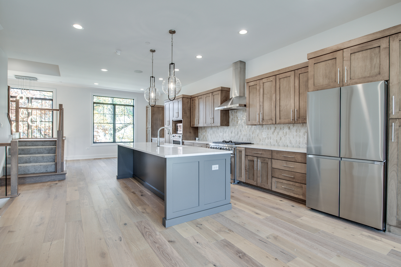 116 North Wright Street, Unit 5 Naperville, IL 60540 - Photo 34 of 62 a kitchen with a refrigerator and a sink