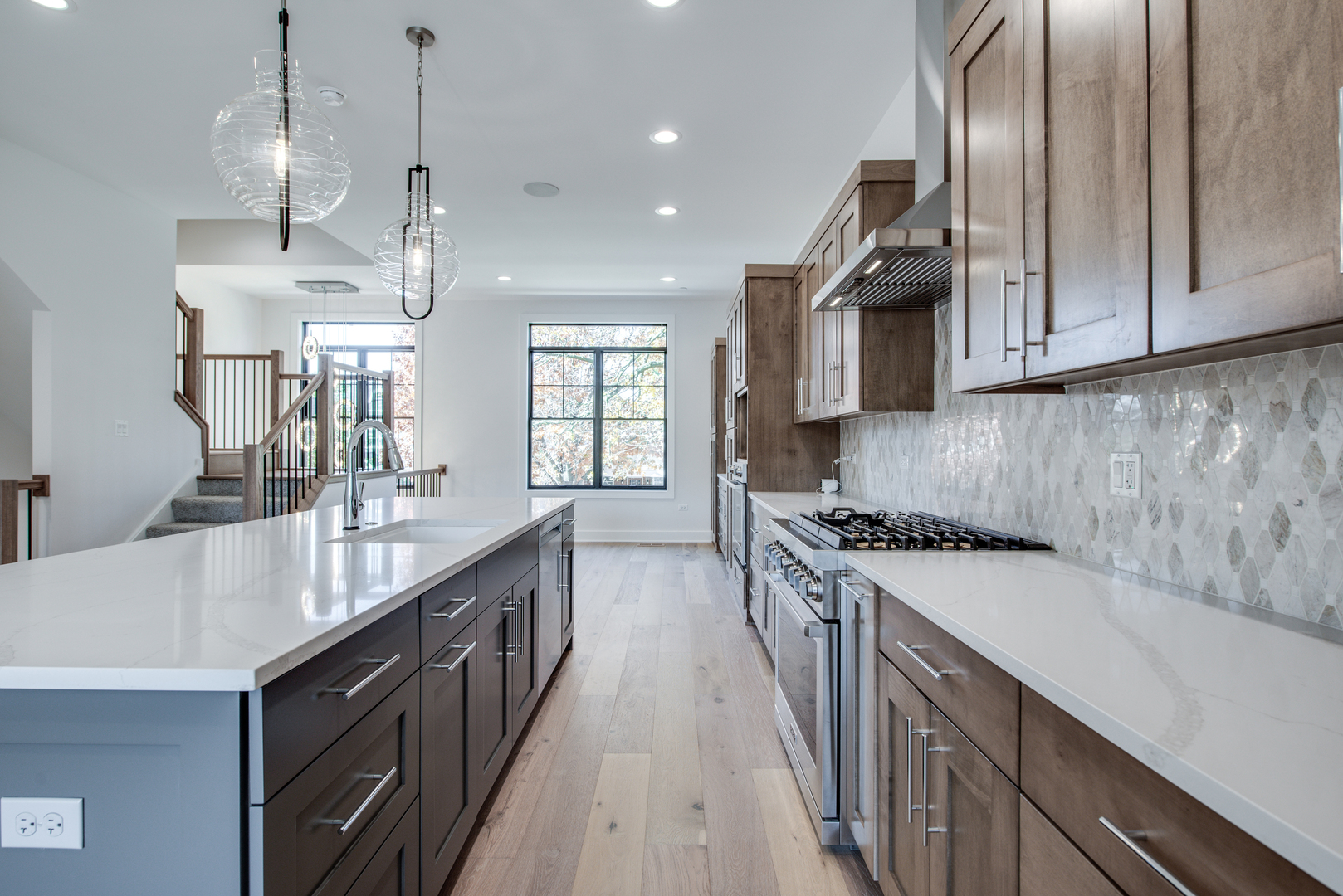 116 North Wright Street, Unit 5 Naperville, IL 60540 - Photo 35 of 62 a kitchen with stainless steel appliances granite countertop a sink a stove and a refrigerator