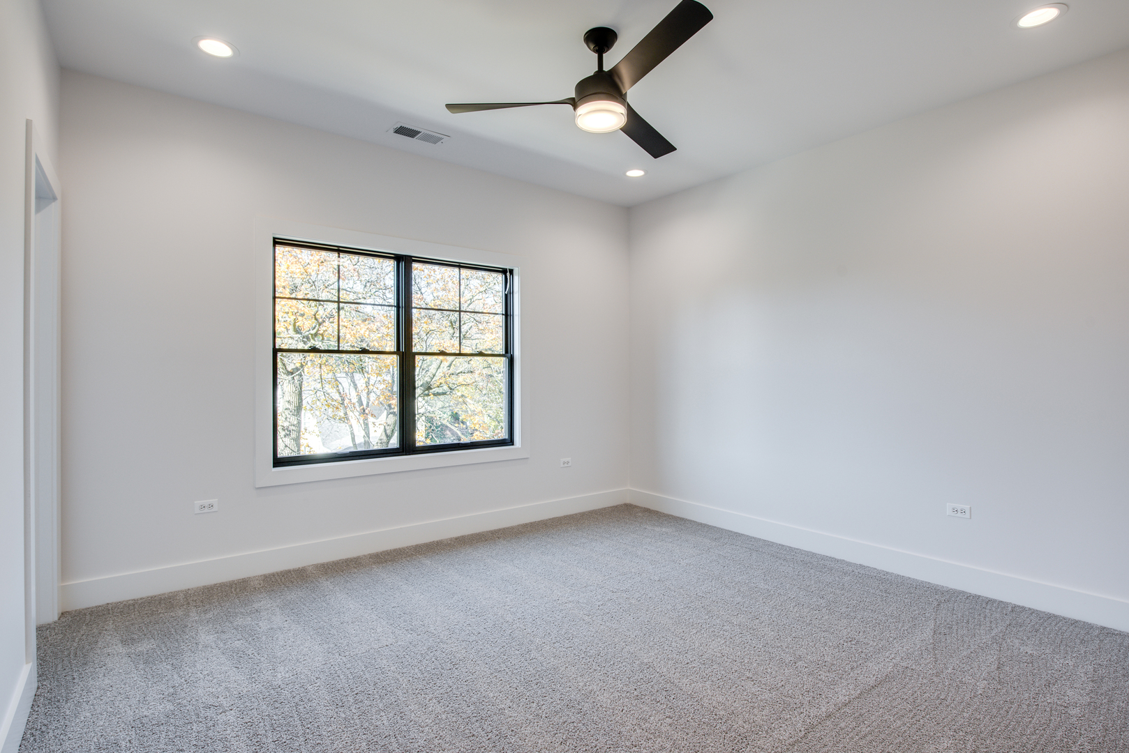 116 North Wright Street, Unit 5 Naperville, IL 60540 - Photo 47 of 62 an empty room with a window