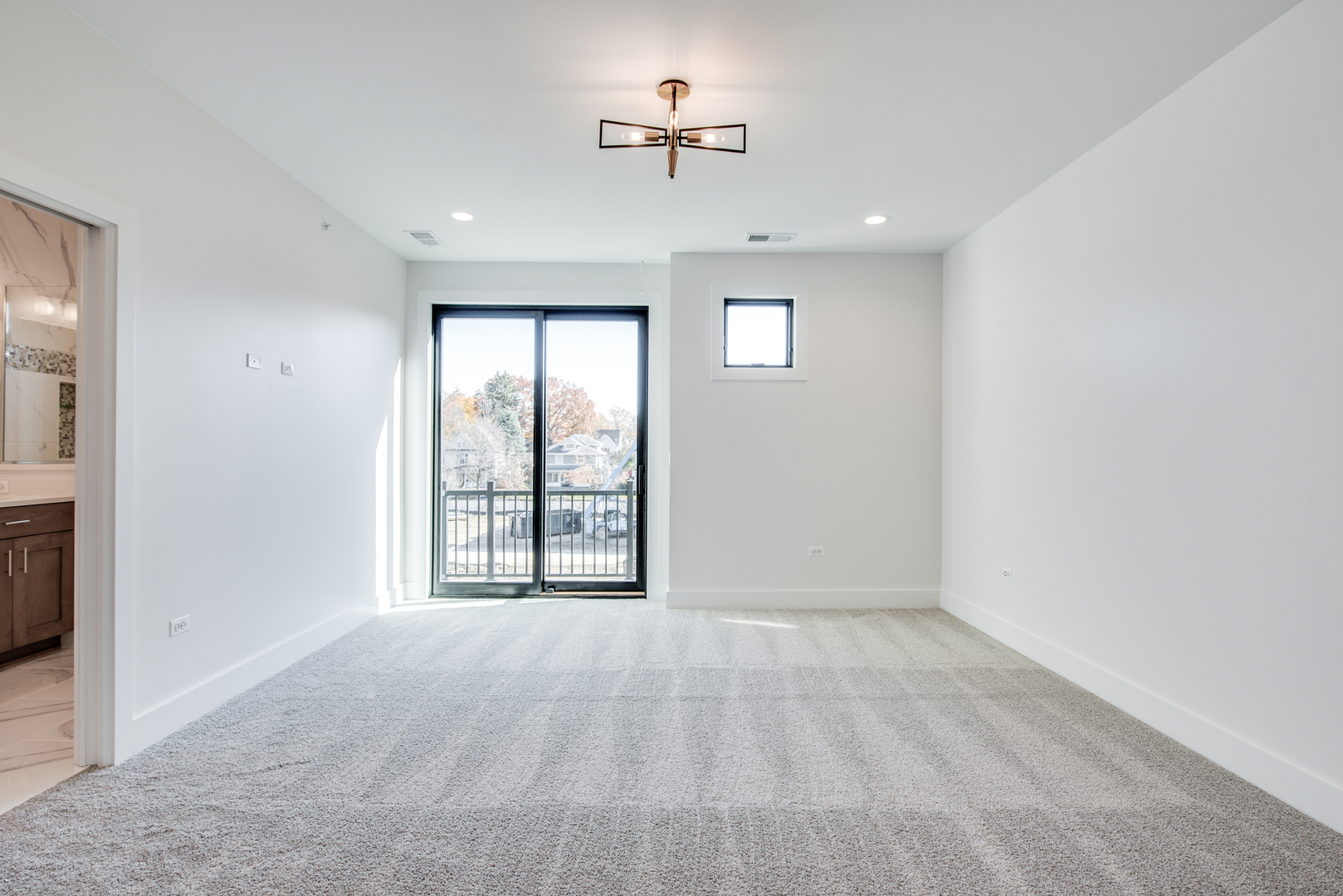 116 North Wright Street, Unit 5 Naperville, IL 60540 - Photo 50 of 62 a view of an empty room with a window