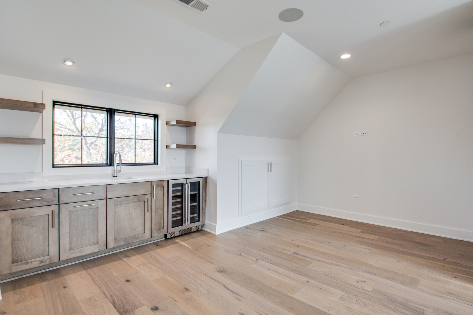 116 North Wright Street, Unit 5 Naperville, IL 60540 - Photo 55 of 62 an empty room with windows and cabinet