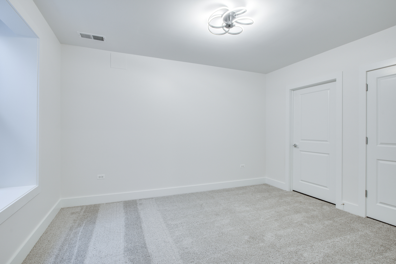 116 North Wright Street, Unit 5 Naperville, IL 60540 - Photo 60 of 62 a view of an empty room