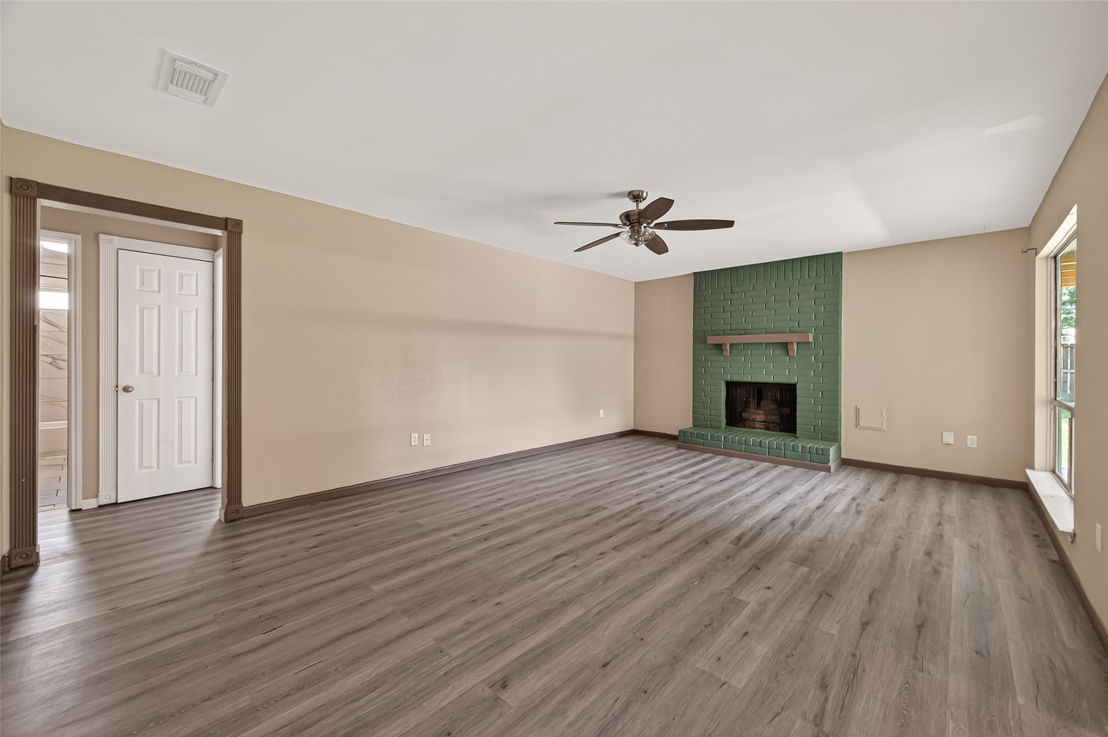 24006 Lone Elm Drive Spring, TX 77373 - Photo 3 of 25 Living room view from the hallway entrance