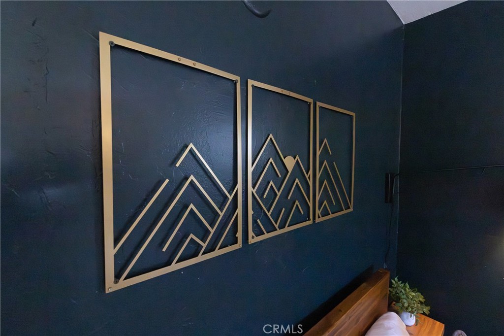 376 Riverside Avenue Sugarloaf, CA 92386 - Photo 12 of 24 Bedroom wall art