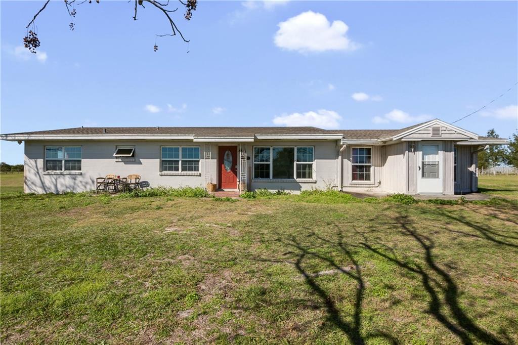 3725 Walker Lake Road Bartow, FL 33830 - Photo 1 of 1 a front view of house with yard