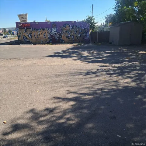 a view of a city street with cars