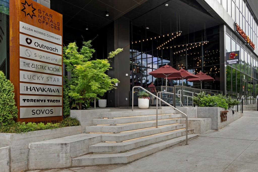 1100 Howell Mill Road Northwest, Unit 808 Atlanta, GA 30318 - Photo 44 of 48 front view of a building with potted plants