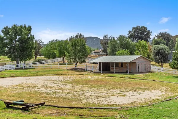 a view of a house with a swimming pool