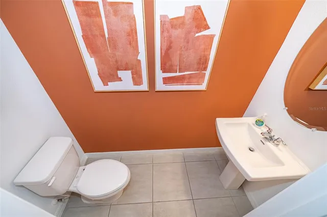 a bathroom with a sink and toilet