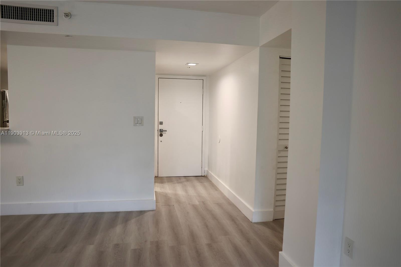 8730 Southwest 133rd Avenue Road, Unit 216 Miami, FL 33183 - Photo 10 of 28 a view of hallway with wooden floor