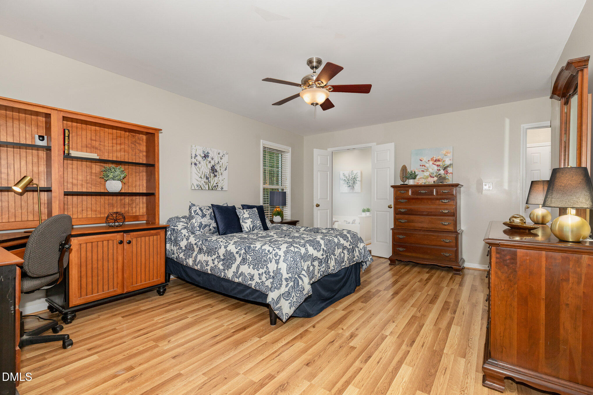 127 Cobble Brook Drive Rougemont, NC 27572 - Photo 12 of 48 a bedroom with a bed and wooden floor