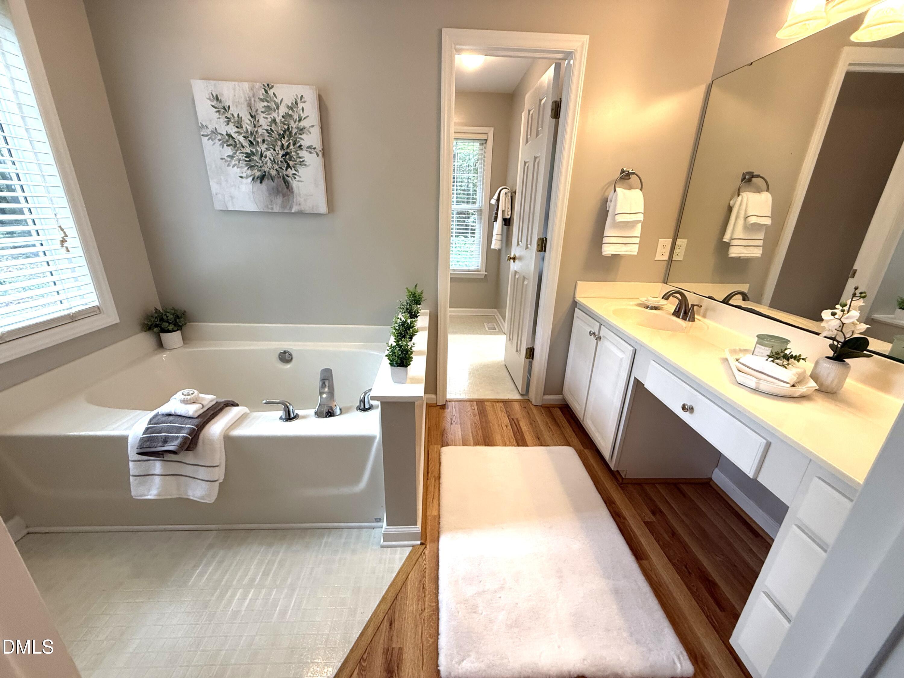 127 Cobble Brook Drive Rougemont, NC 27572 - Photo 14 of 48 a living room with a couch and a stove next to a window