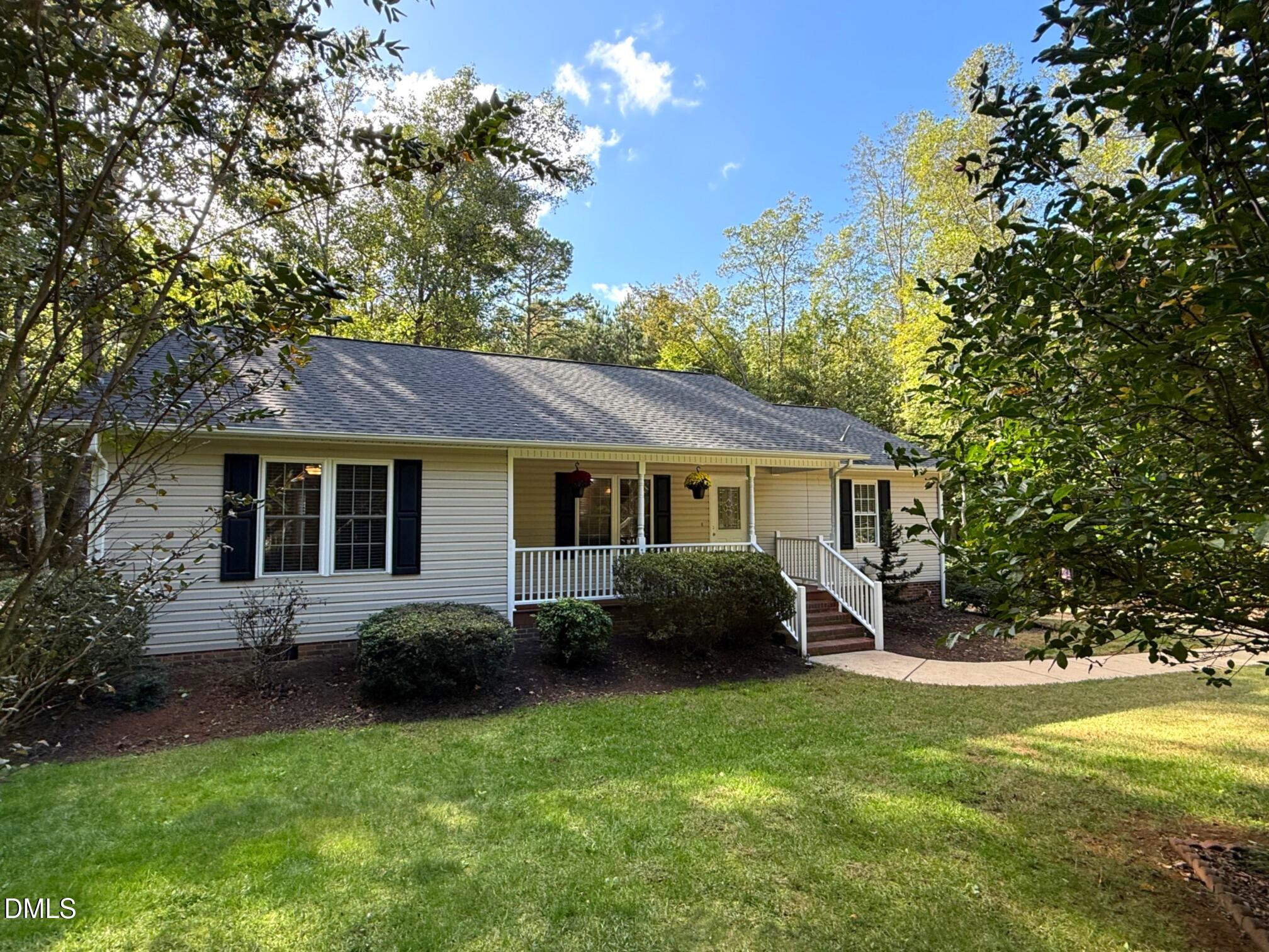 127 Cobble Brook Drive Rougemont, NC 27572 - Photo 23 of 48 a view of a house with a yard