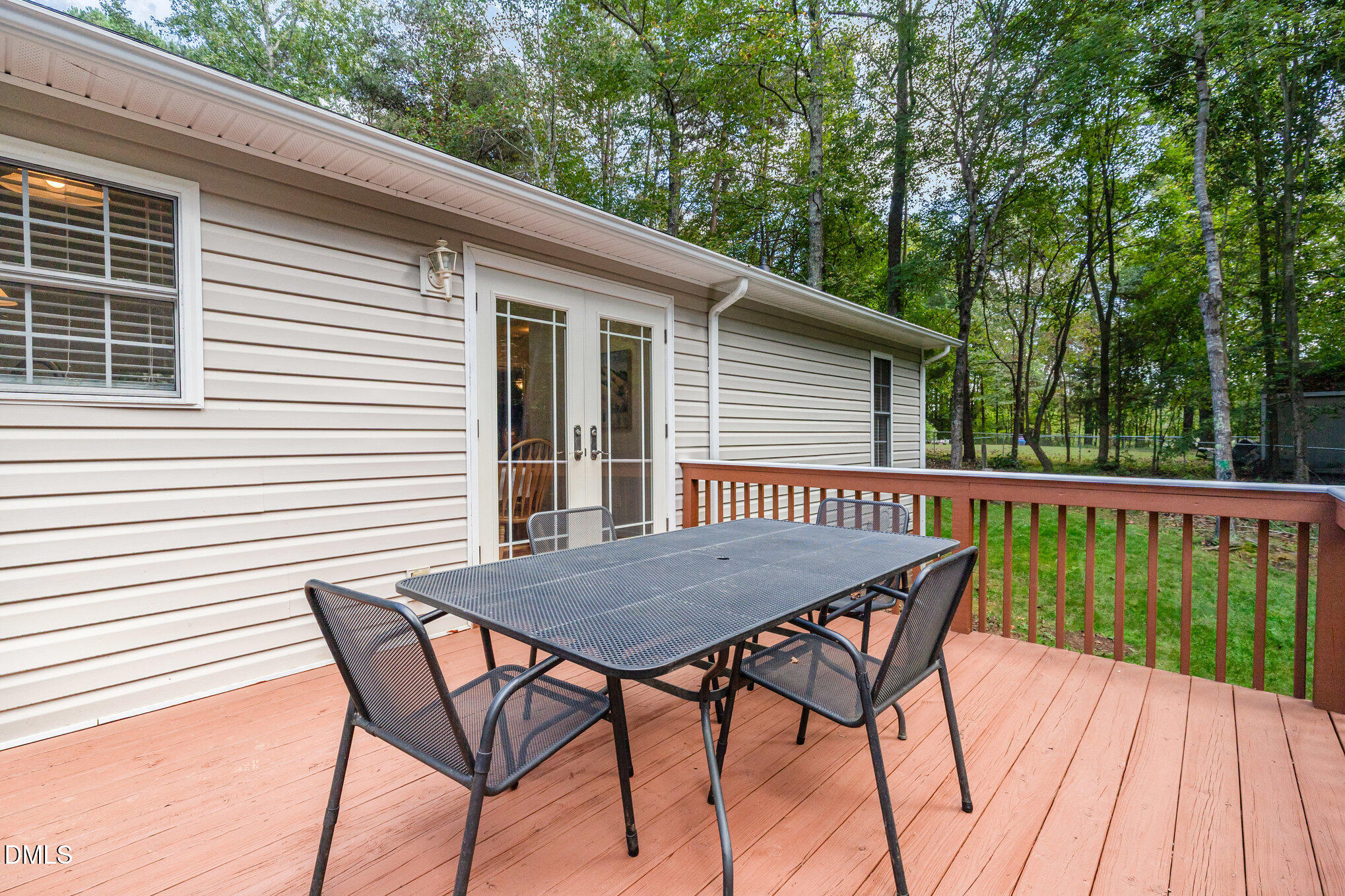 127 Cobble Brook Drive Rougemont, NC 27572 - Photo 29 of 48 a view of backyard with a deck and wooden floor