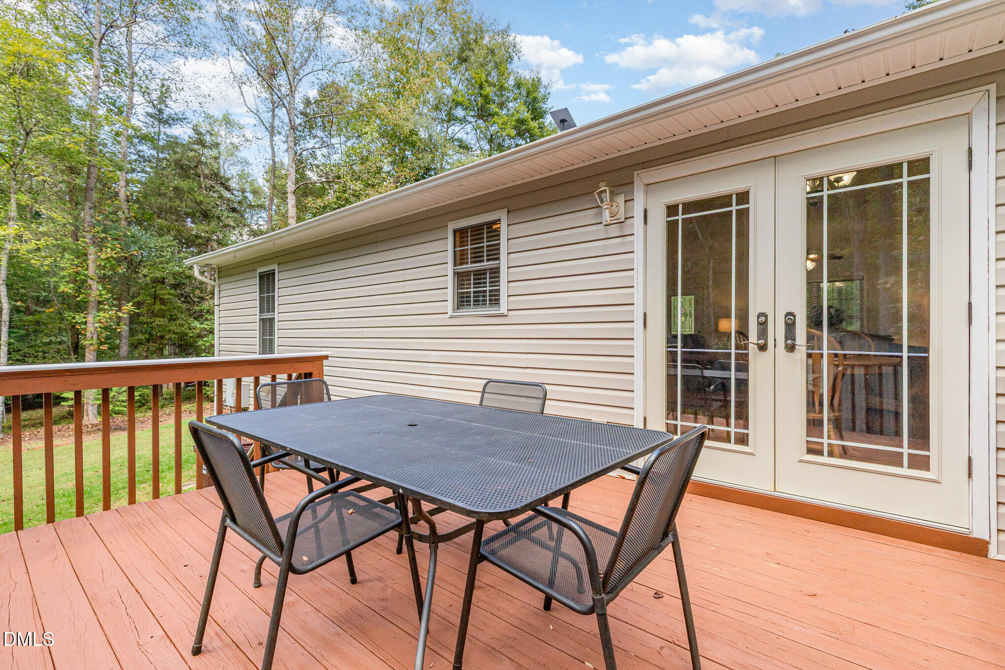 127 Cobble Brook Drive Rougemont, NC 27572 - Photo 31 of 48 a view of a wooden chairs and table in the balcony