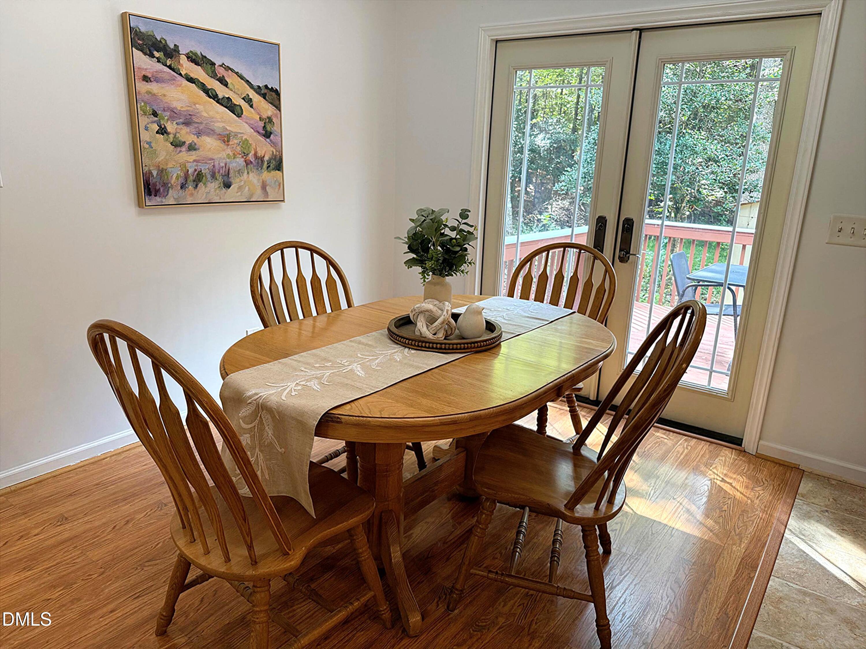 127 Cobble Brook Drive Rougemont, NC 27572 - Photo 6 of 48 a view of a dining room with furniture window and wooden floor