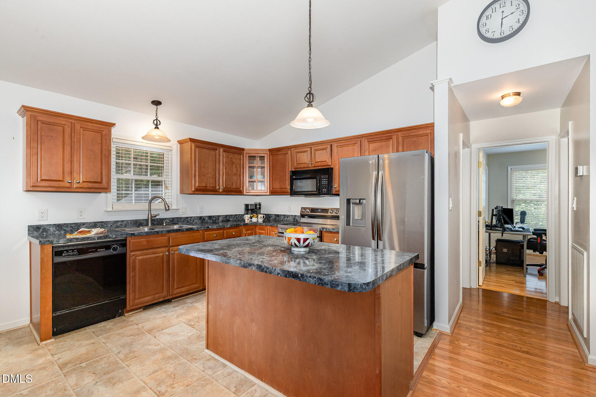 127 Cobble Brook Drive Rougemont, NC 27572 - Photo 8 of 48 a kitchen with stainless steel appliances granite countertop a sink stove and refrigerator