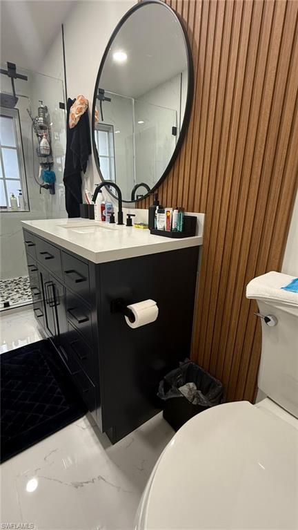 14122 Southwest 276th Street Homestead, FL 33032 - Photo 17 of 47 Full bath with vanity, a walk in shower, and light marble finish floors