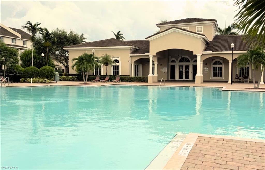 14122 Southwest 276th Street Homestead, FL 33032 - Photo 34 of 47 Community pool featuring a patio