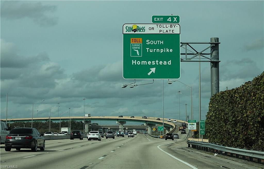 14122 Southwest 276th Street Homestead, FL 33032 - Photo 45 of 47 View of asphalt road featuring street lighting