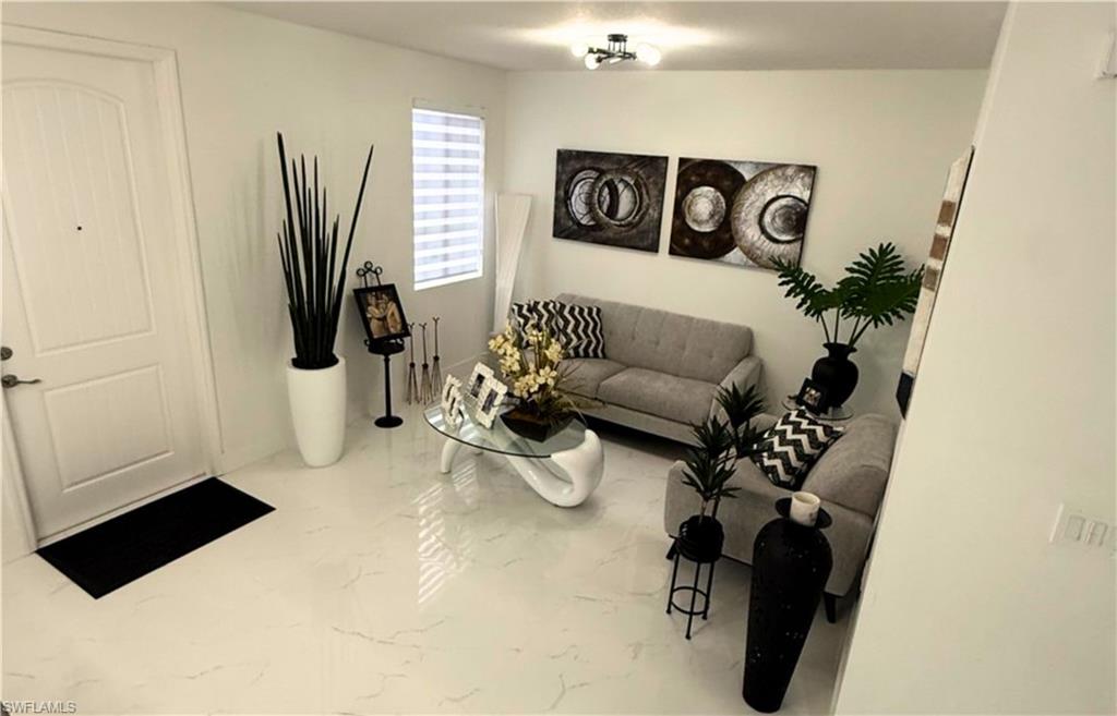 14122 Southwest 276th Street Homestead, FL 33032 - Photo 8 of 47 Living area with marble finish floors