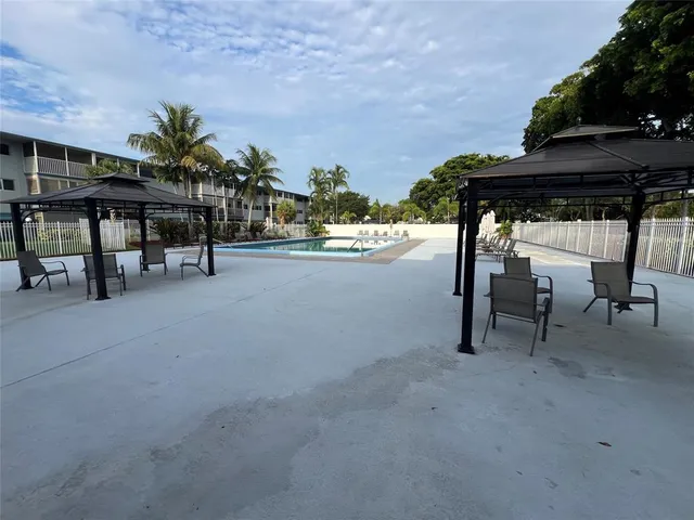 a view of sign board and lake view