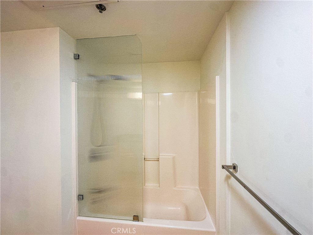 200 North San Fernando Road, Unit 313 Los Angeles, CA 90031 - Photo 14 of 29 a bathroom with a glass shower door