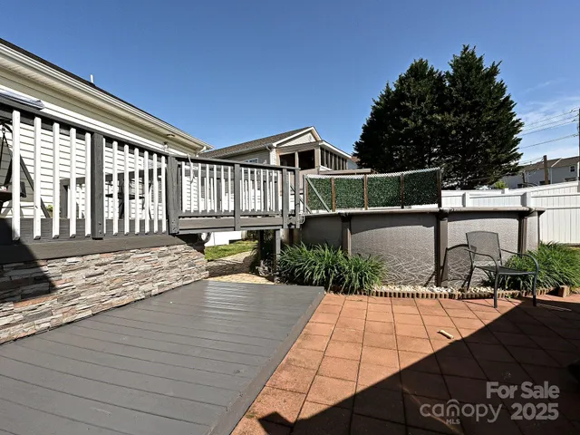 a view of swimming pool with outdoor seating