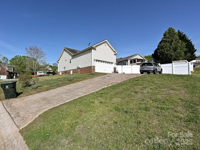 a house view with a garden space
