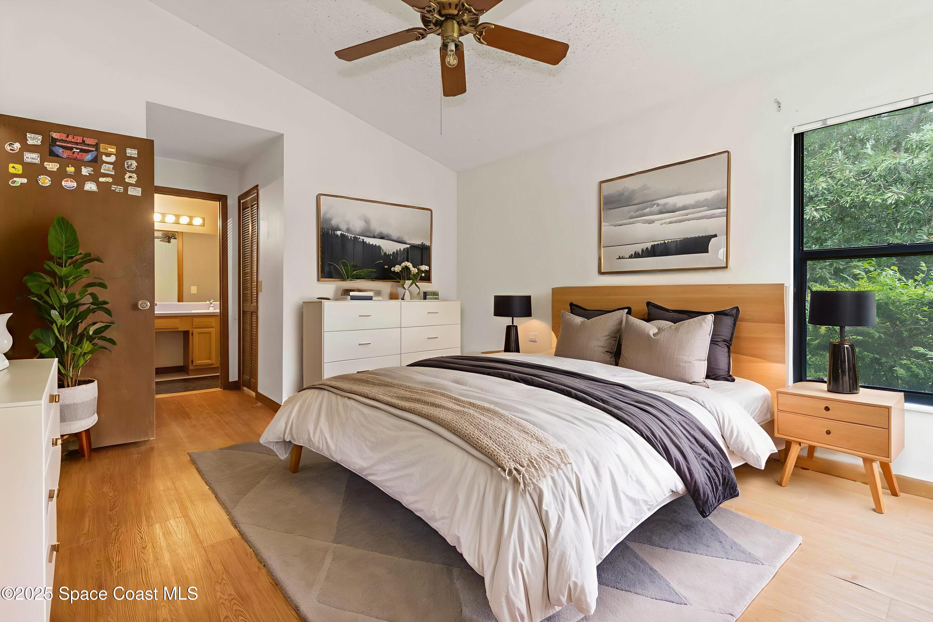 1873 Longleaf Road Cocoa, FL 32926 - Photo 17 of 30 a bedroom with bed and window