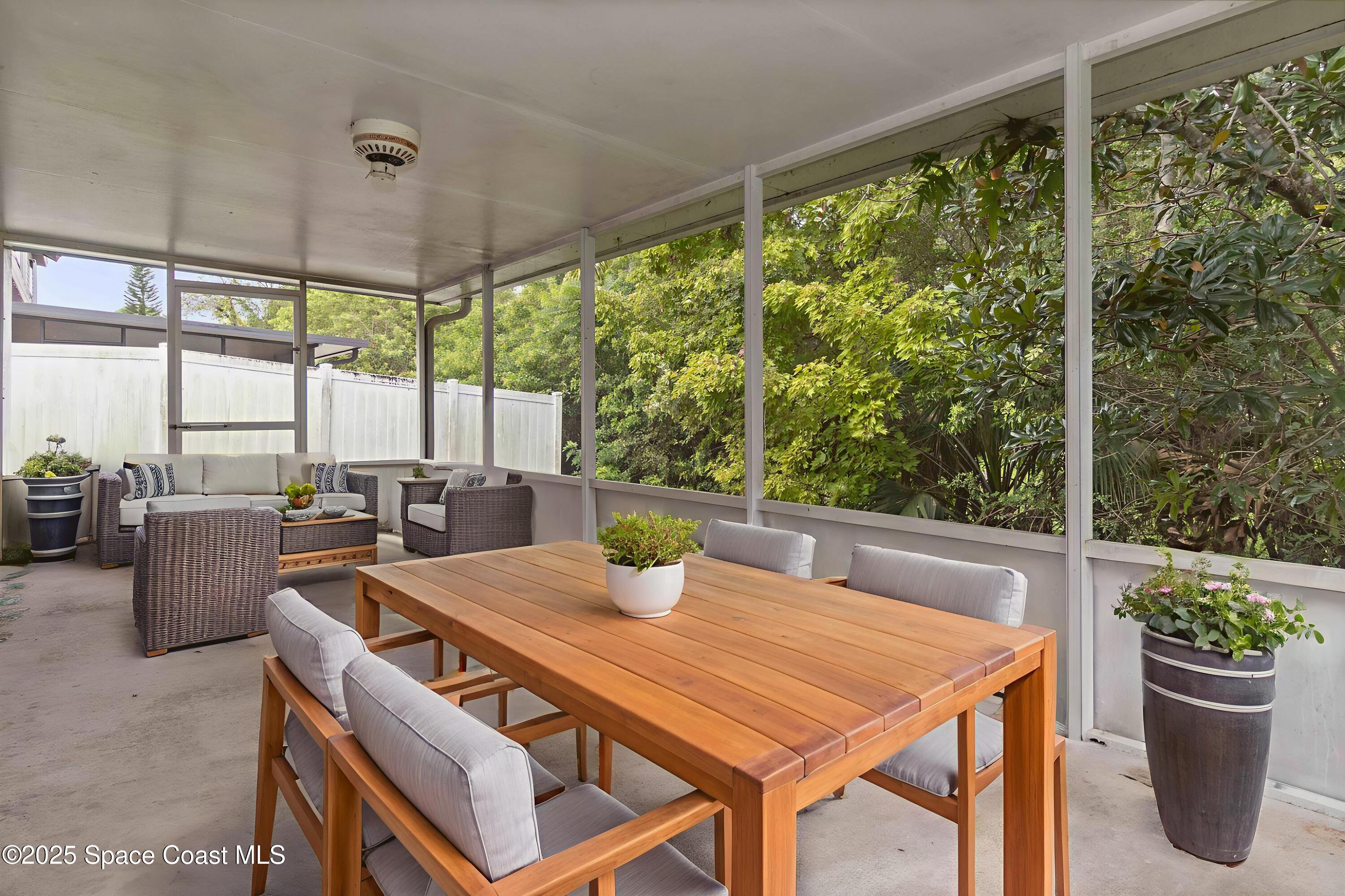 1873 Longleaf Road Cocoa, FL 32926 - Photo 27 of 30 a view of an outdoor dining space with furniture