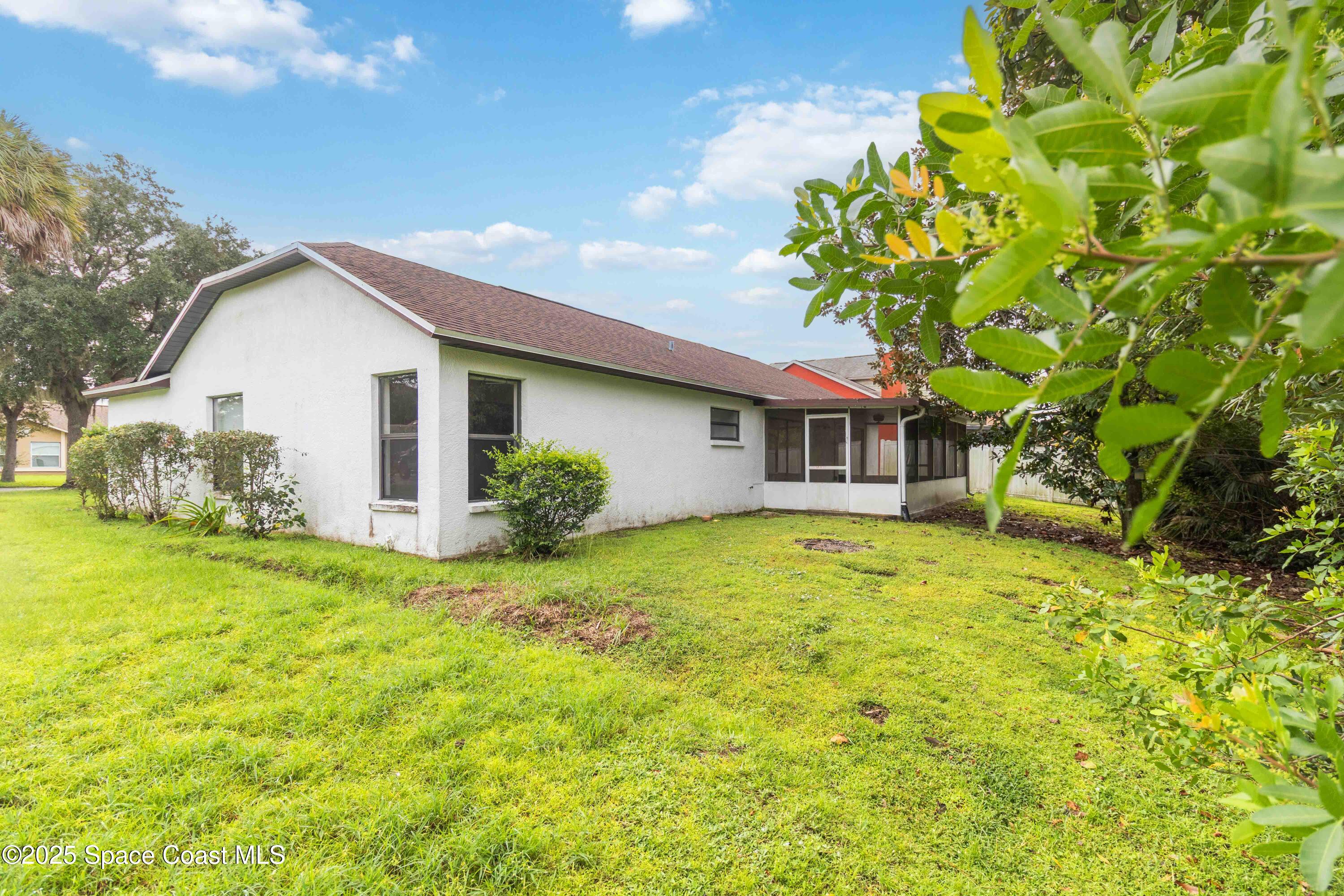 1873 Longleaf Road Cocoa, FL 32926 - Photo 29 of 30 a view of a house with backyard