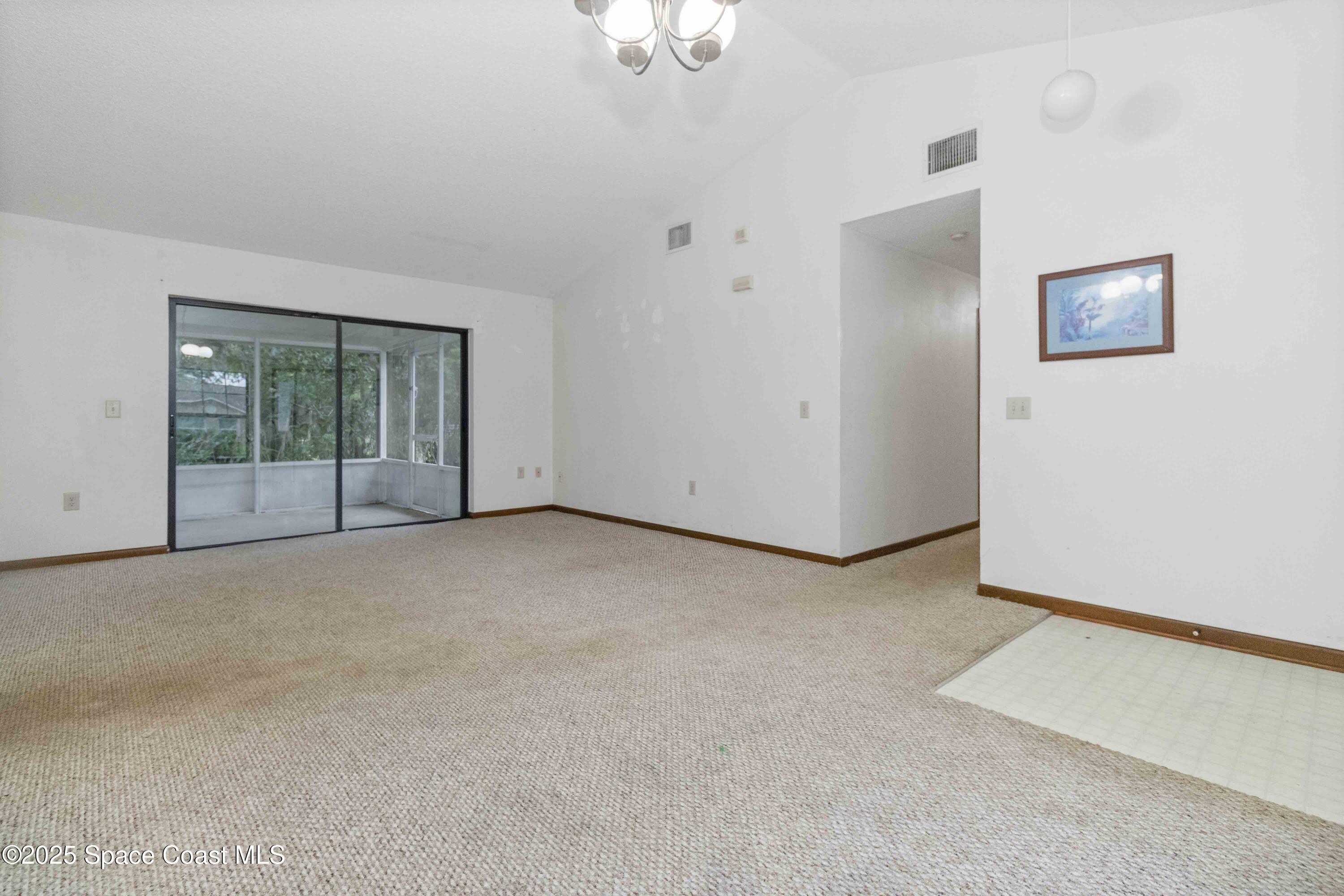 1873 Longleaf Road Cocoa, FL 32926 - Photo 6 of 30 a view of an empty room with a window