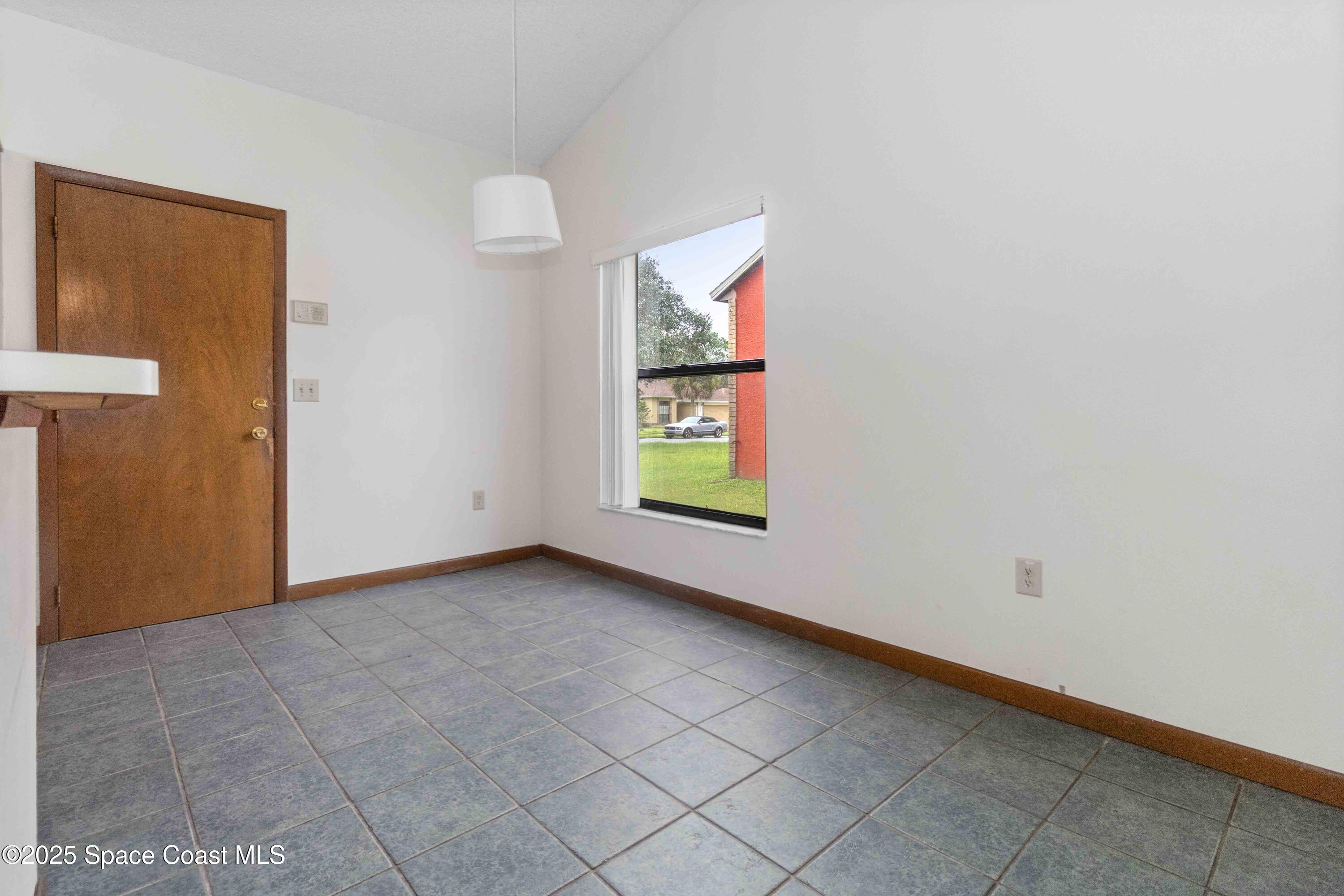 1873 Longleaf Road Cocoa, FL 32926 - Photo 9 of 30 a view of an empty room and window