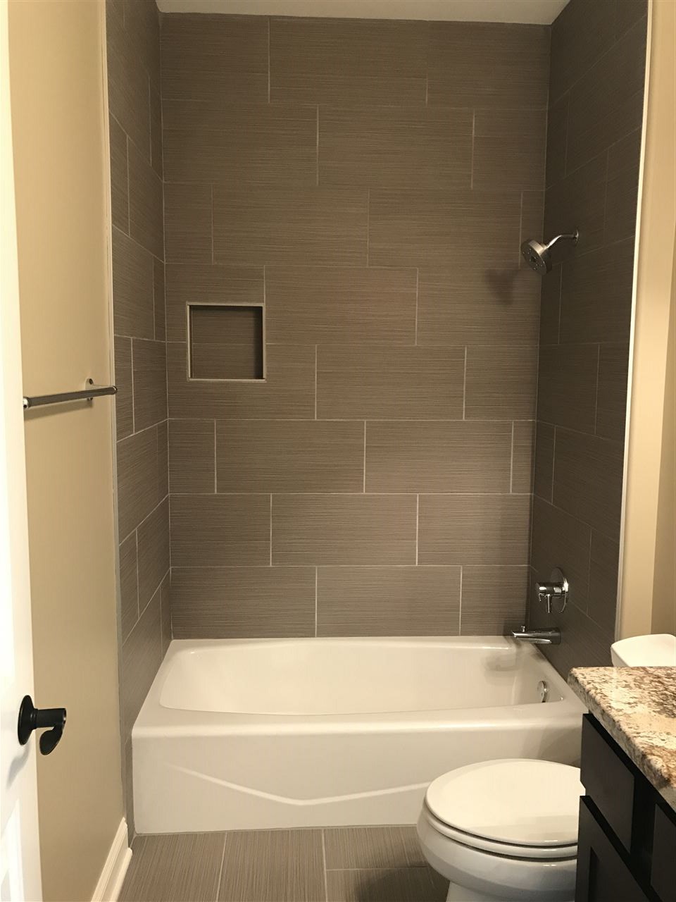2840 Hamson Way Belvidere, IL 61008 - Photo 11 of 24 a bathroom with a granite countertop bathtub shower sink vanity and toilet
